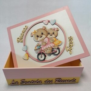 SCATOLA CON ORSETTE SU BICI